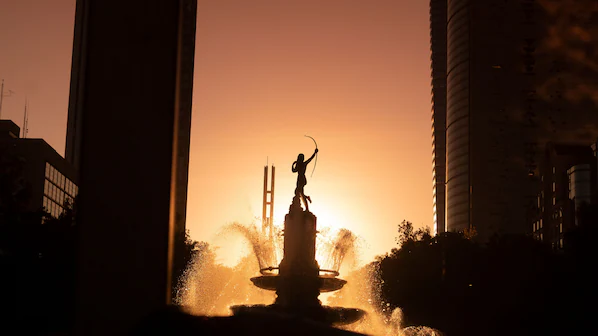 Diana the Huntress fountain near Dreams Acapulco Resort & Spa at sunset along Costera Miguel Alemán