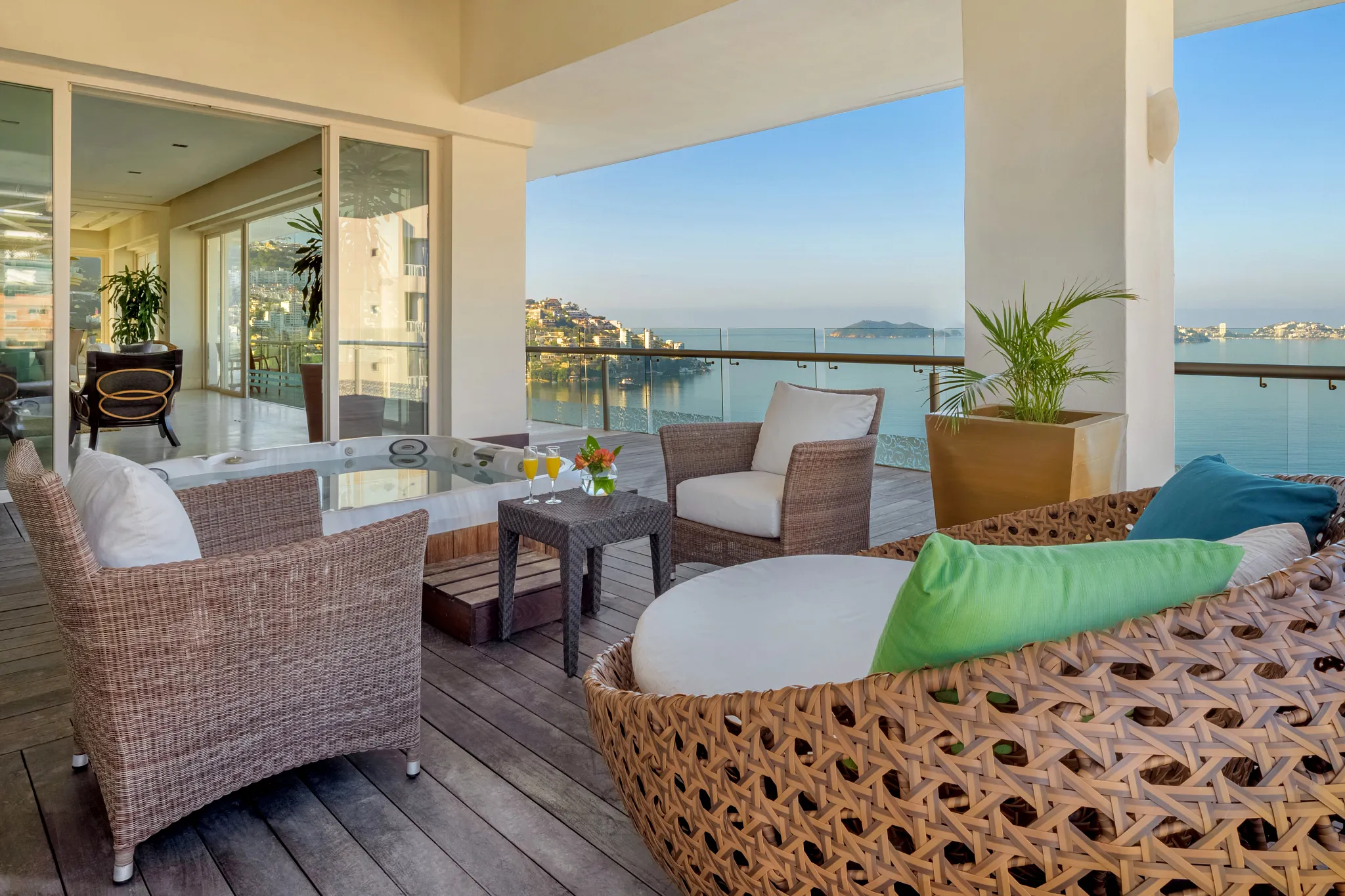 Preferred Club Presidential Three-Bedroom Ocean Front wraparound terrace with hot tub at Dreams Acapulco Resort & Spa.